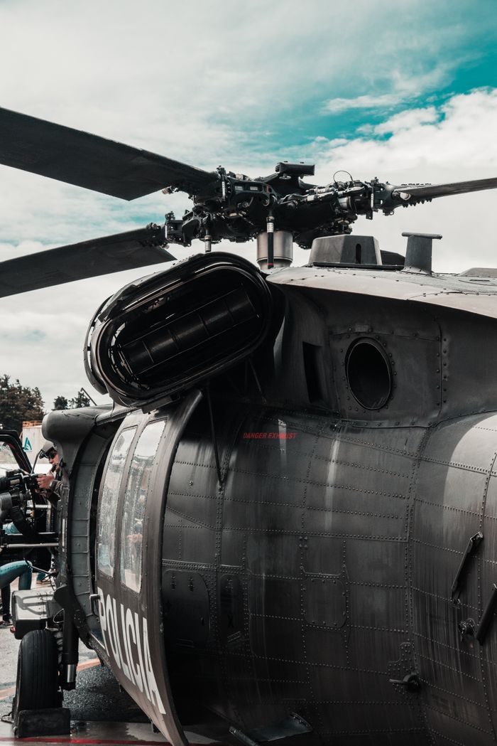 services-03 Detailed view of a military helicopter in Antioquia, showcasing aviation technology.